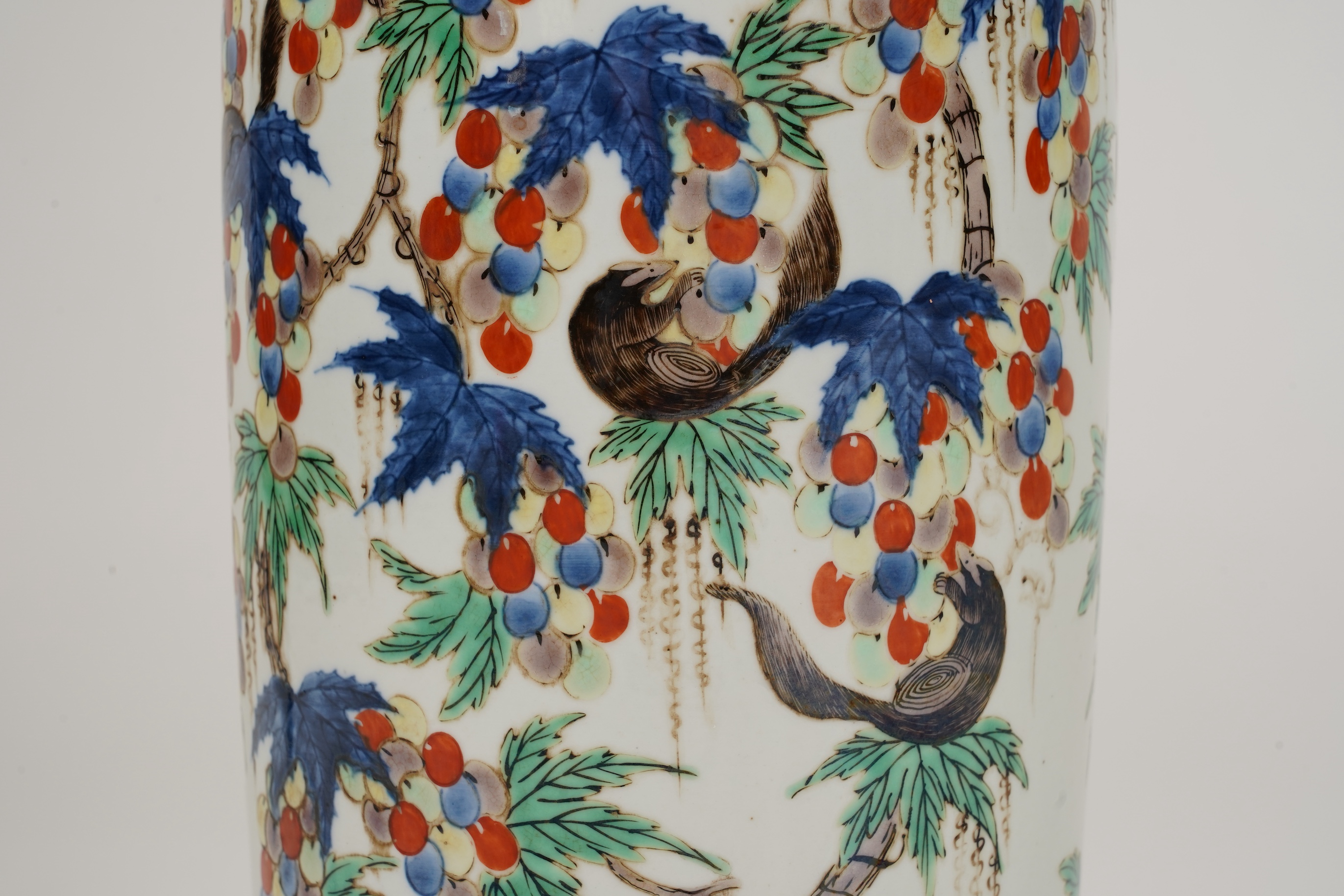 A Chinese wucai ‘squirrel and grapevine’ sleeve vase, Kangxi style